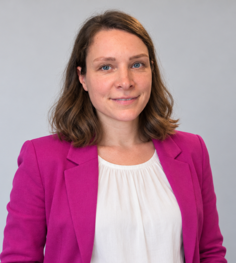 Wavy-haired professional in magenta blazer2